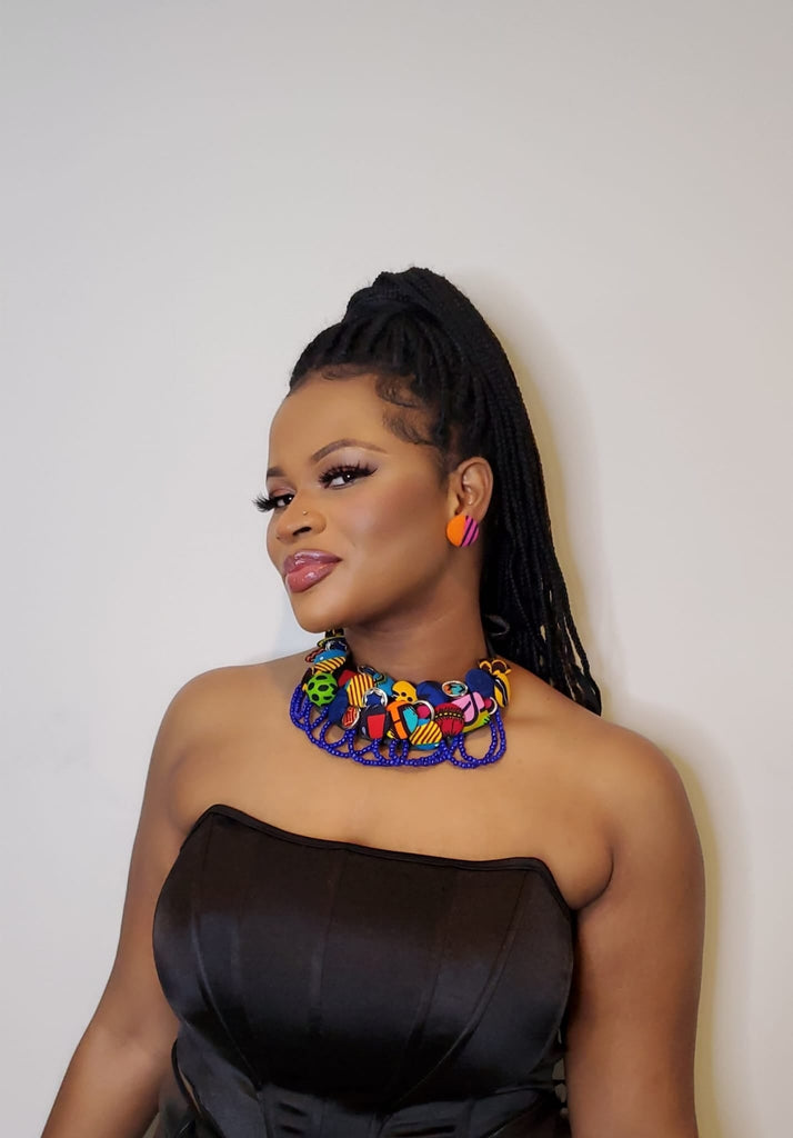 Juliet Ewurabena wearing our Allure Studd Earrings