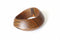 Wooden bracelet with striped pattern on a marble surface