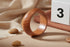 Wooden ring on a marble surface