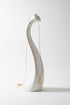 Gold necklace on a marble surface
