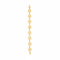 Gold chain bracelet on a marble surface