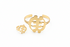 Two gold rings with unique designs on a white background