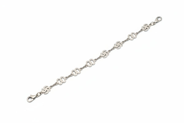 Silver bracelet on a marble surface