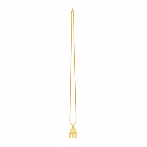 Gold Necklace on a marble surface