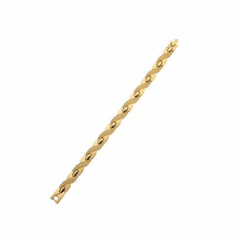 Gold bracelet on a marble surface