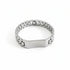 Metallic bracelet on a marble surface
