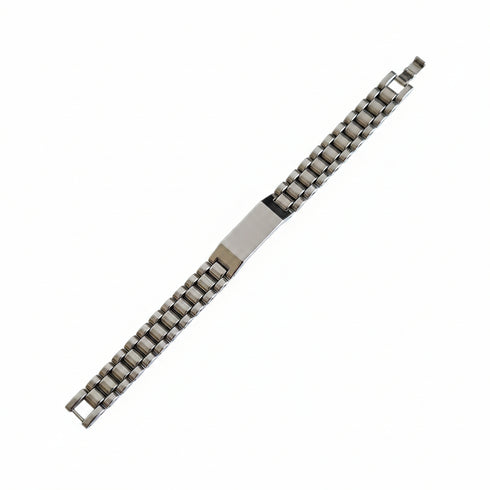 Metallic watch strap on a marble surface