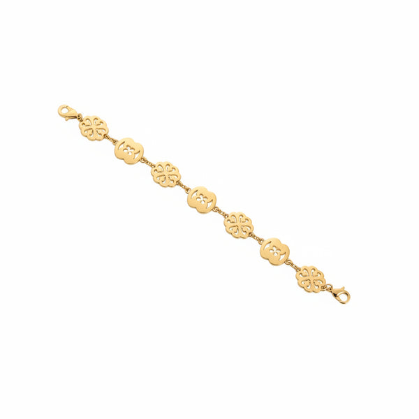 Gold bracelet on a marble surface