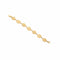 Gold bracelet on a marble surface
