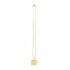 Gold necklace with a black clasp on a marble surface