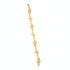 Gold bracelet with intricate designs on a white background