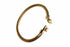 Gold hoop earrings on a marble background
