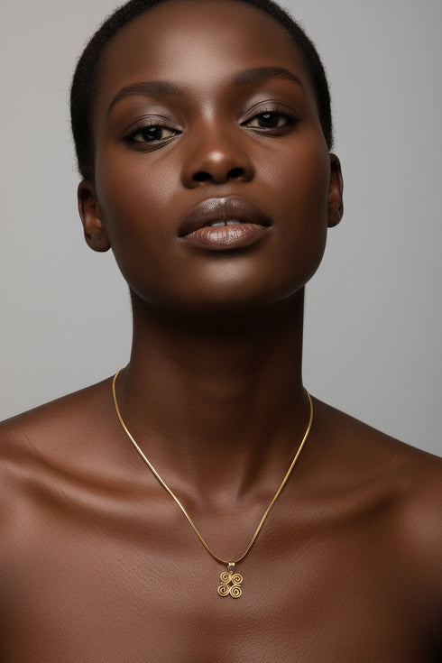 Gold hairpin on a marble surface