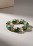 handmade African bracelet, green marble beaded bracelet, African-inspired jewelry, handmade beaded accessories, elegant gift bracelet, artisanal women’s bracelet, African heritage jewelry, luxury handmade jewelry