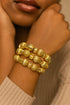 AMANI Elegant Gold-Tone Handmade Glass Bead Hand Bracelet