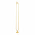 Gold necklace on a marble surface