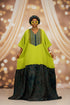 A person modeling a bright lime green and black traditional African outfit with yellow sunglasses in an indoor setting. Text overlays advertise the price and contact information for mamash exclusive.