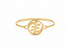 Gold bracelet with a circular design on a white background