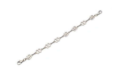 Silver bracelet on a marble surface