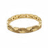 Gold bracelet on a marble surface
