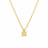 Gold necklace with a spiral pendant on a marble background