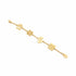 Gold bracelet with floral and leaf designs on a marble surface