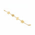 Gold bracelet with various charms on a marble surface