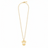 Gold necklace with a heart-shaped pendant on a white background