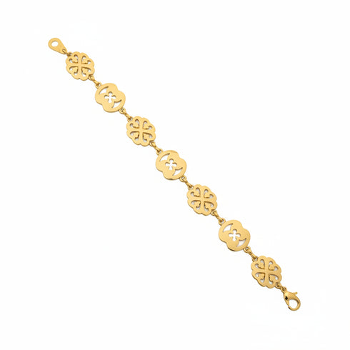 Gold bracelet on a marble surface