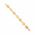 Gold bracelet on a marble surface