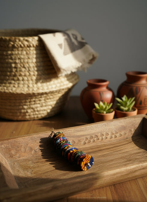 NUBIA Royale tiered chandelier Ankara button drop earrings