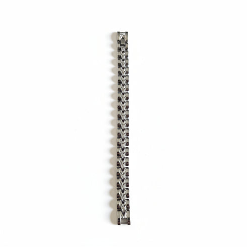 Silver bracelet on a marble surface