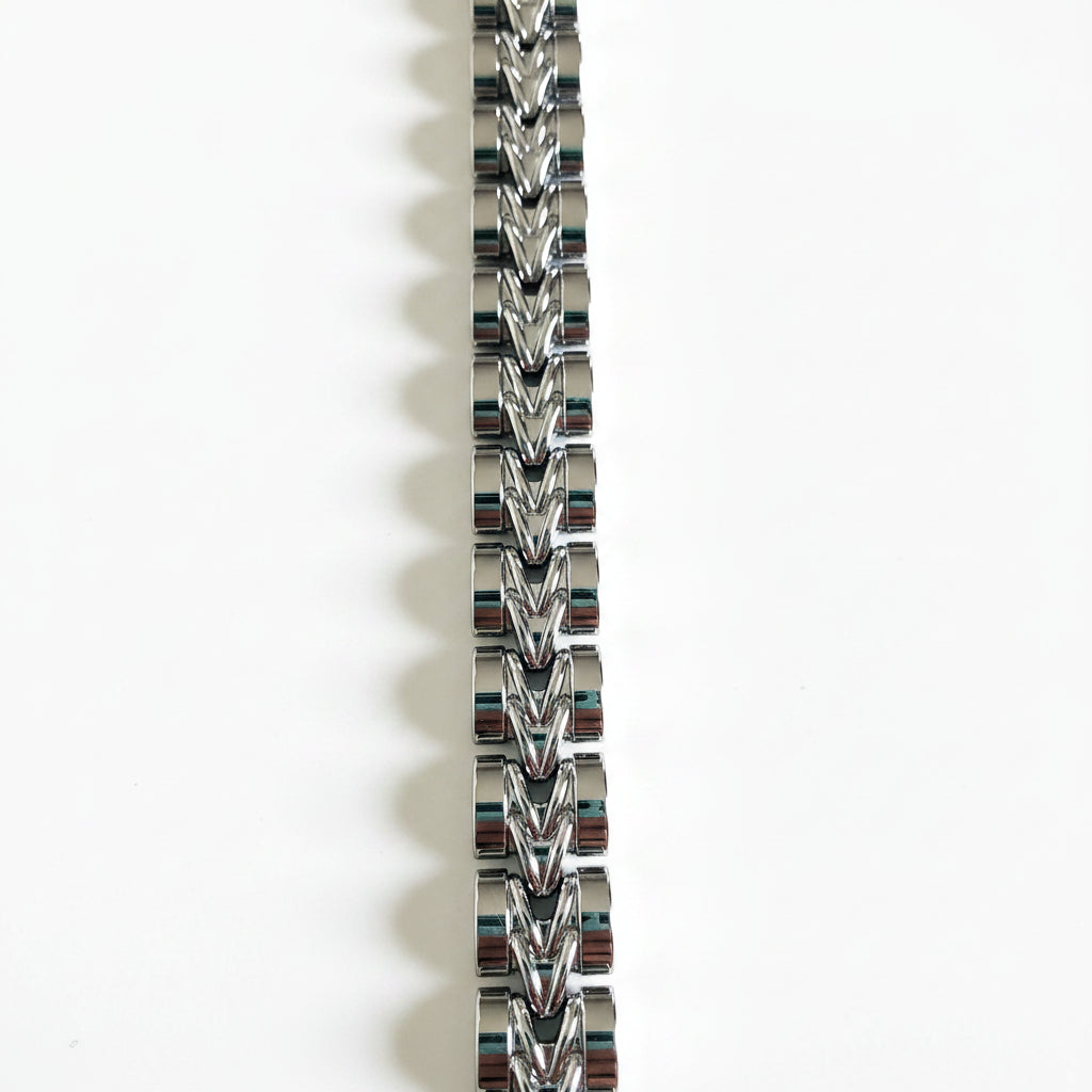 Silver chain bracelet on a white background