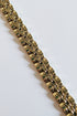 Gold chain on a marble surface