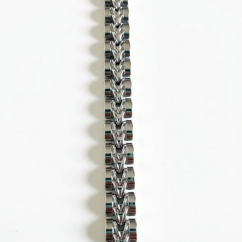 Silver chain bracelet on a white background
