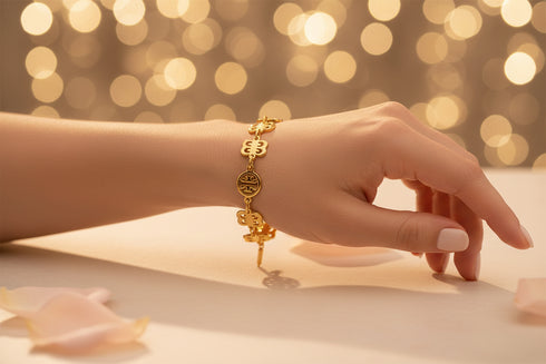 Gold bracelet on a marble surface