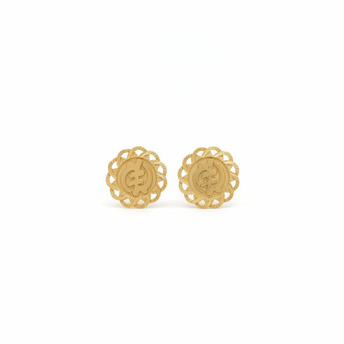 Pair of gold earrings on a white background