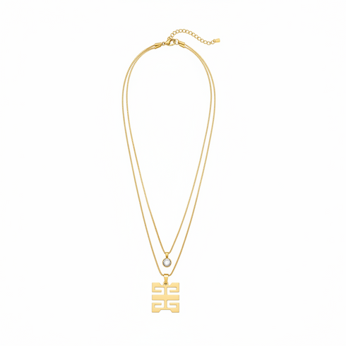 Gold necklace with a double happiness pendant on a white background