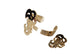 Gold bracelet with decorative elements on a marble surface
